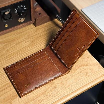 Interior view of a handcrafted classic bifold leather wallet with personalized names, made in Calgary.