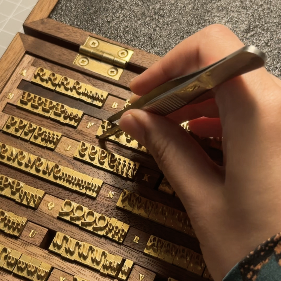 Personalizing with traditional gold foil stamping or engraving in Calgary studio.