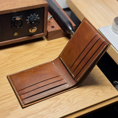 Inside view of the classic vegetable-tanned bifold wallet showing 8 card slots and premium finish.