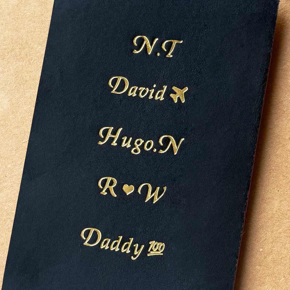 Personalized gold foil stamping font options for custom leather gifts.