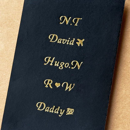 Personalized gold foil stamping font options for custom leather gifts.