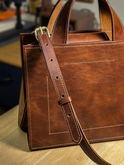 The clean and smooth back panel of the Maple Heritage handcrafted leather bag.