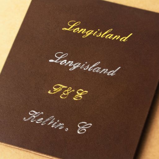 Examples of personalized initials engraved on brown vegetable-tanned leather.