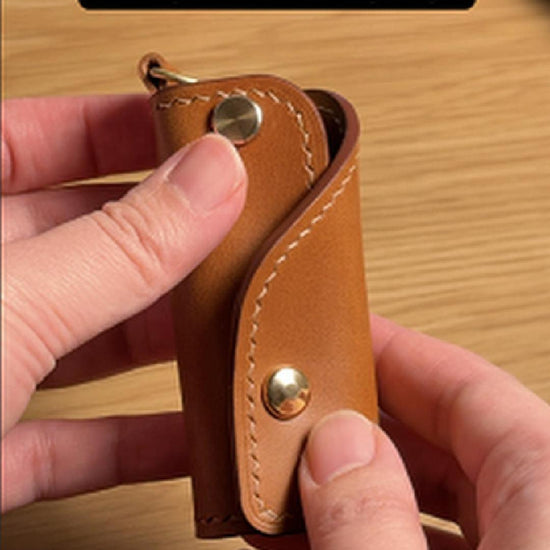 Demonstration of the SIDECAR sliding key organizer showing how keys slide out smoothly from the leather case. Handcrafted in Calgary
