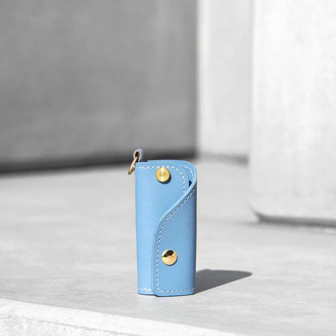 The SIDECAR custom leather key case in angel blue, a slim and durable key holder for personalized gifts
