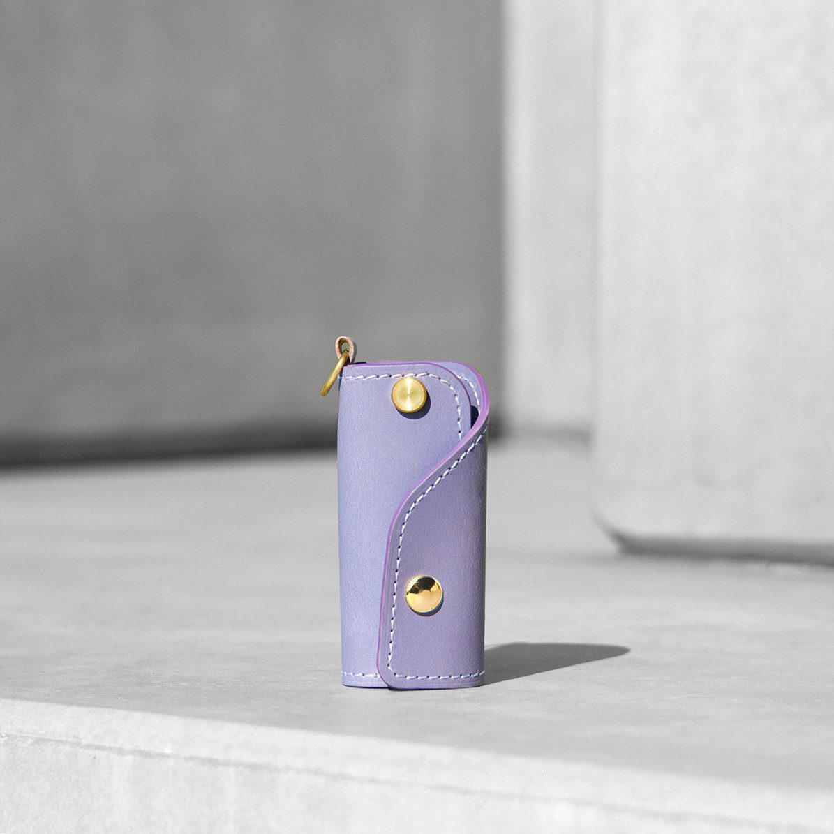 The SIDECAR custom leather key case in lavender purple, a slim and durable key holder for personalized gifts