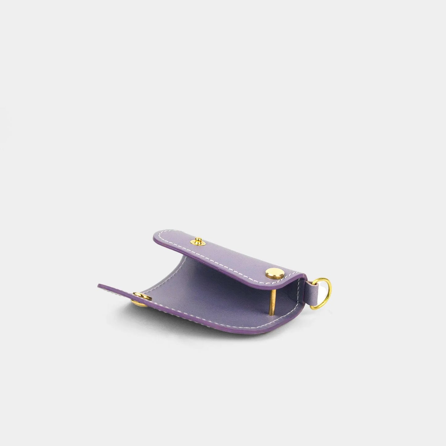 The empty Lavender SIDECAR minimalist leather key case, highlighting the polished D-ring and organized internal storage.